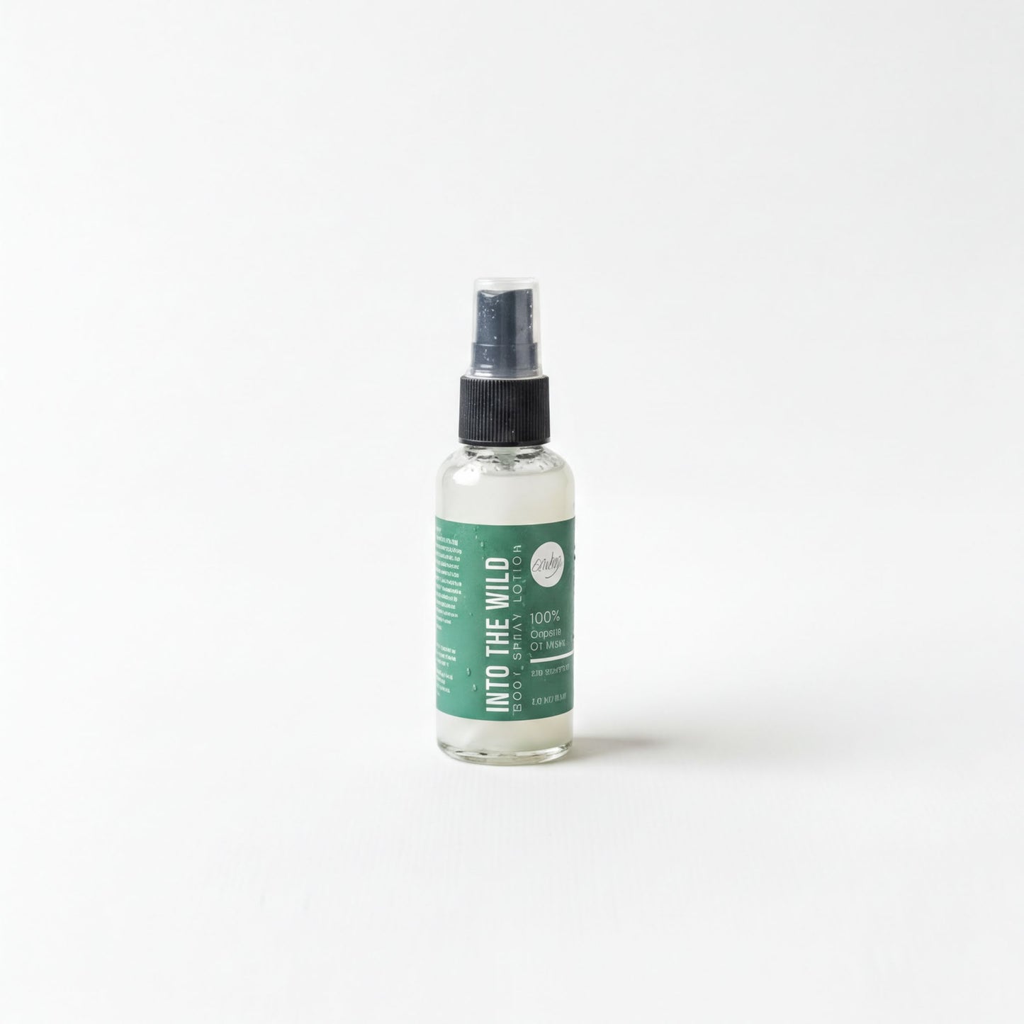 A bottle of "Into the Wild" lotion is shown against a white background.