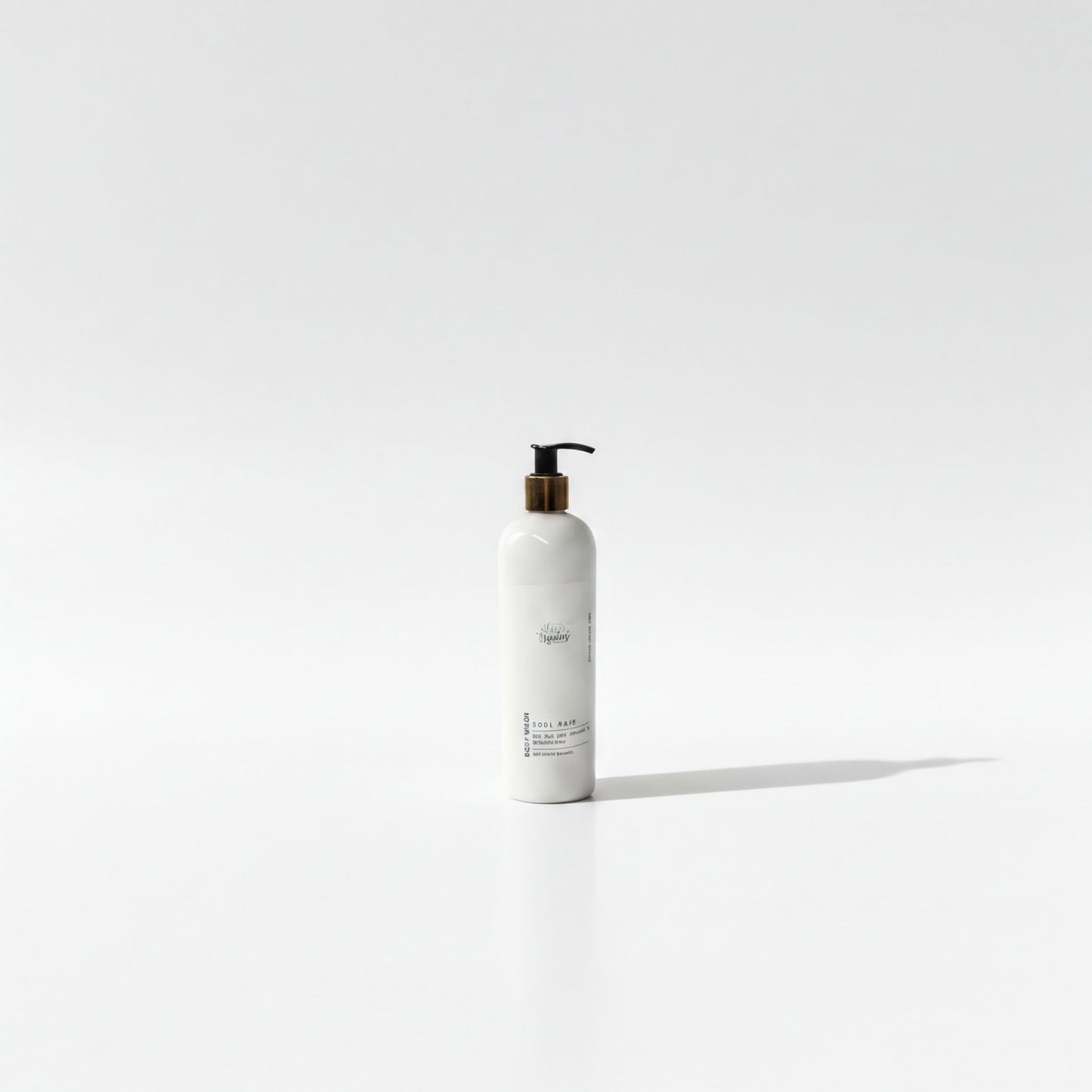 A white pump bottle with a black pump and label stands alone against a plain white background.