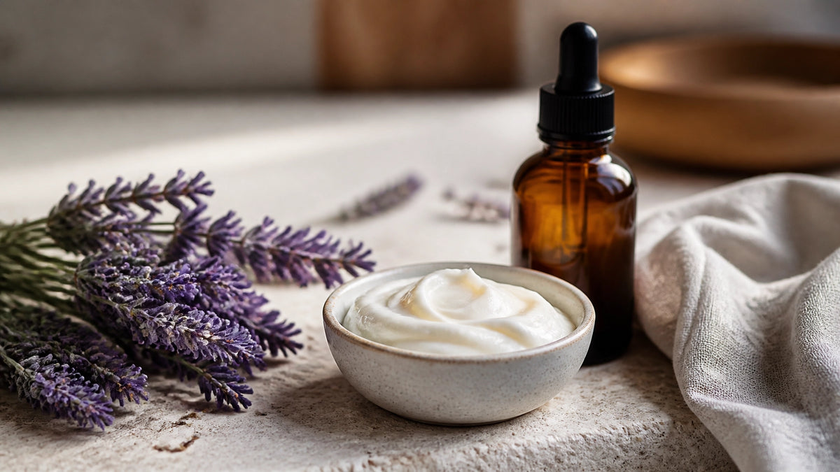 A soothing collection of natural skincare elements including lavender and botanical cream