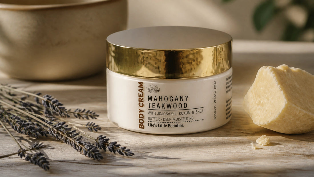 Luxurious organic body butter in a tranquil, natural setting with dried lavender and raw shea.