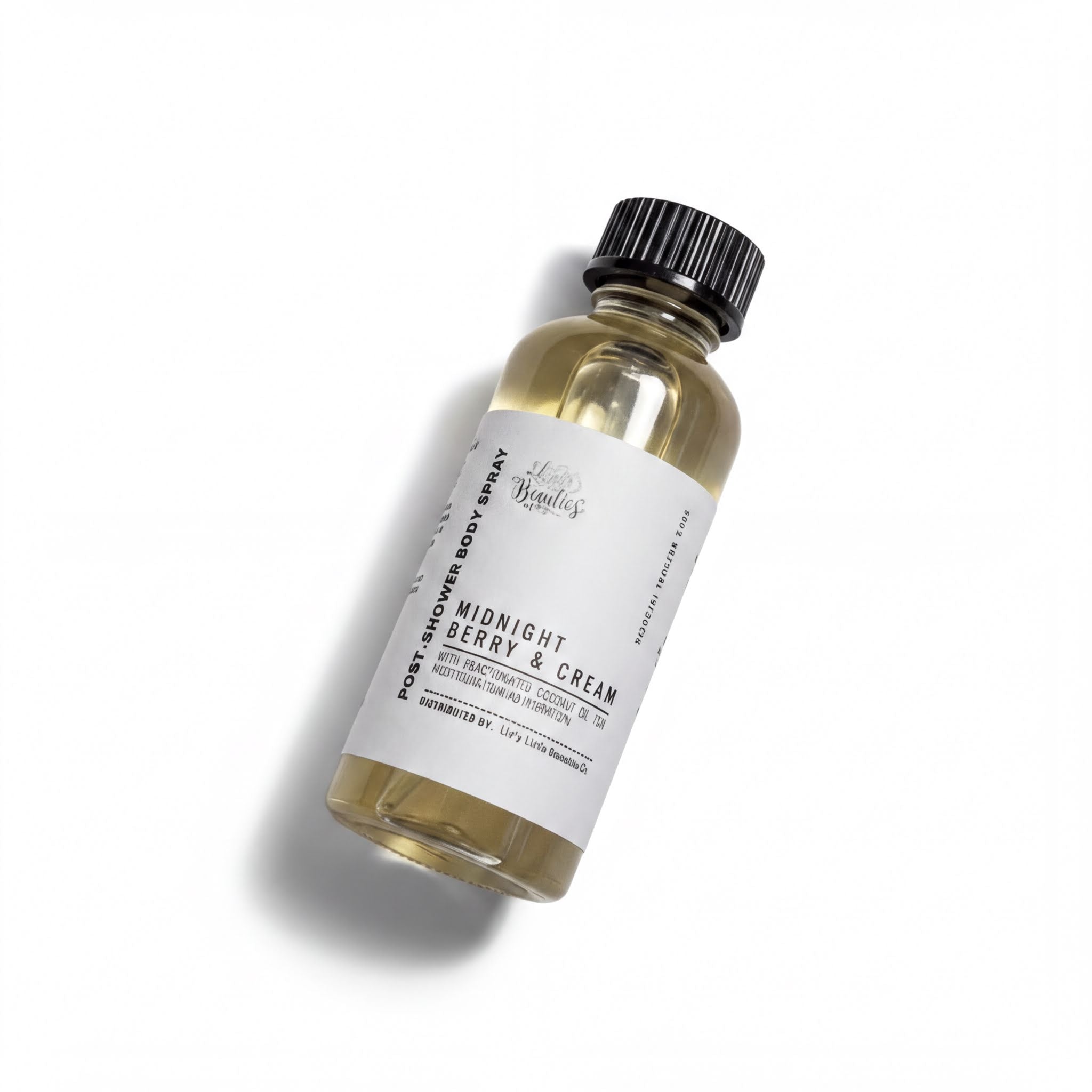 A bottle of "Midnight Berry & Cream" body oil with a black cap, sitting on a white background.