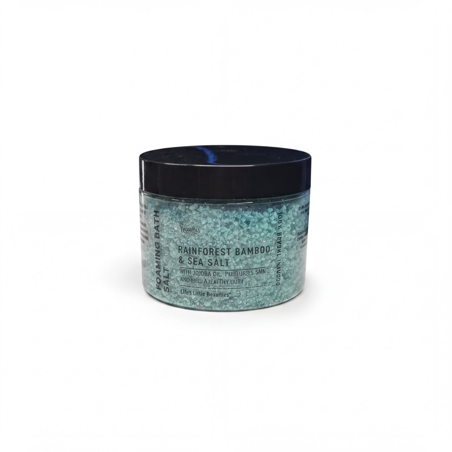 A jar of blue-green sea salt with a black lid, labeled as a "Rainforest Bamboo & Sea Salt" product.