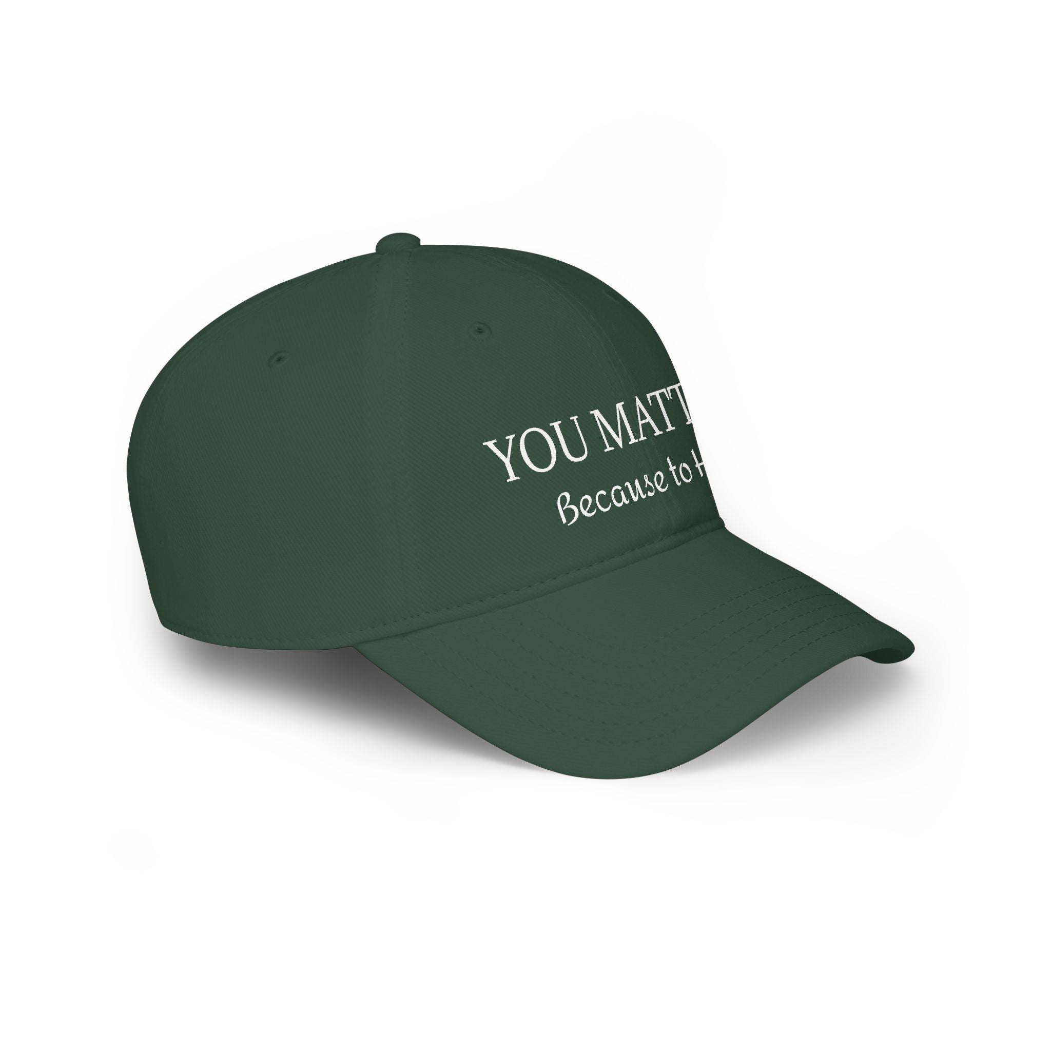 Dark green cap with 'YOU MATTER Because to' text, handcrafted natural beauty accessory
