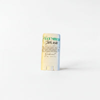 A cucumber-flavored deodorant stick with a white and green label, placed against a white background.