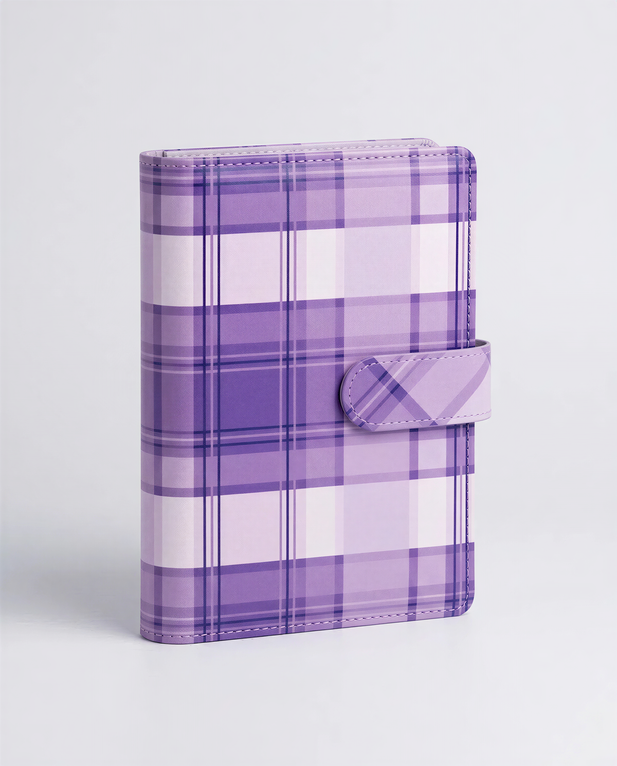 A purple and white plaid wallet or card holder with a leather-like texture and a small leather clip on the front.