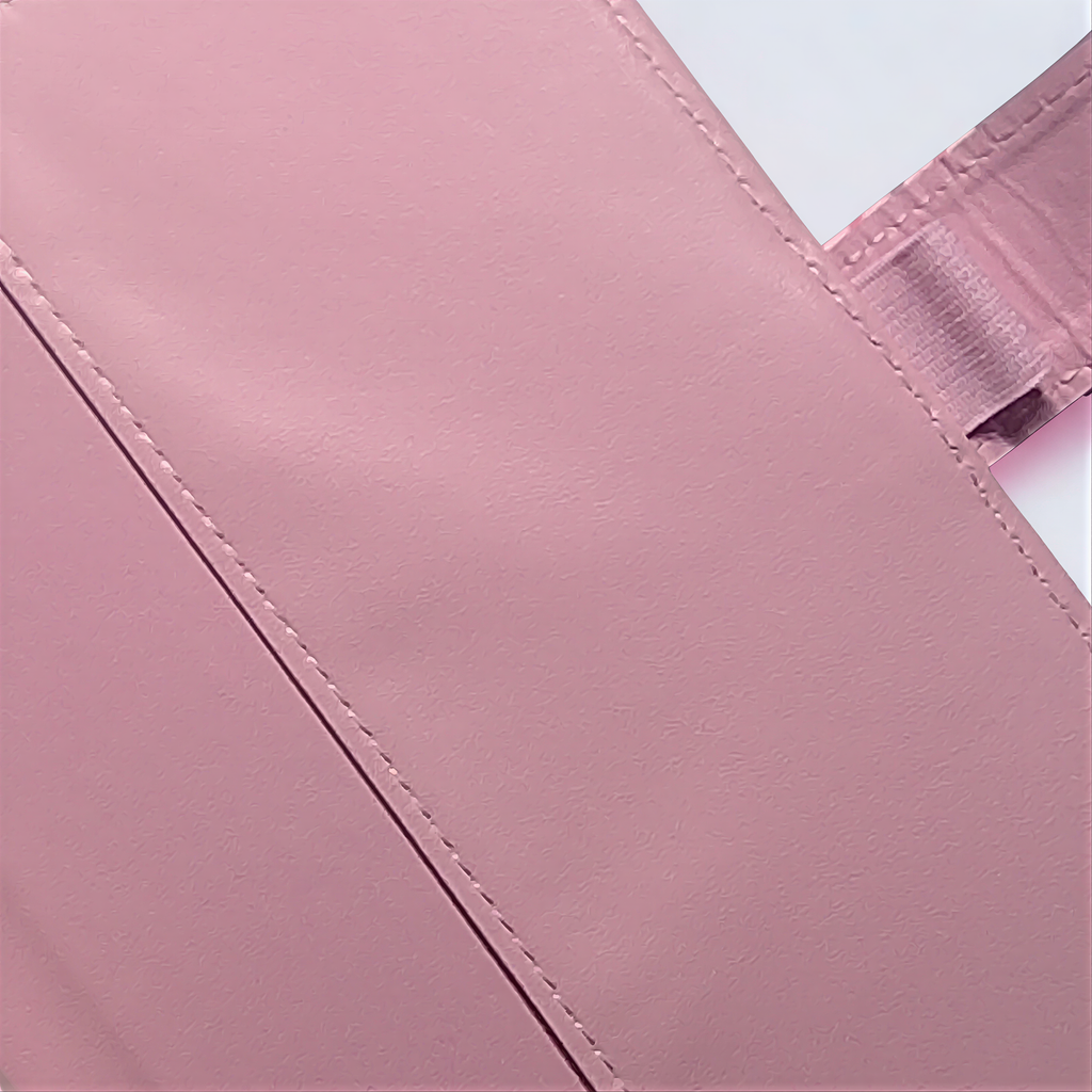 Pink textured soap bar with visible stitching, handcrafted with natural ingredients