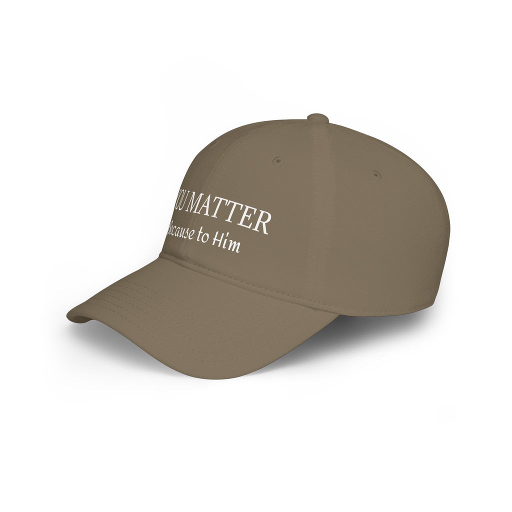 Brown cap with white text 'YOU MATTER Because to Him' on clean background