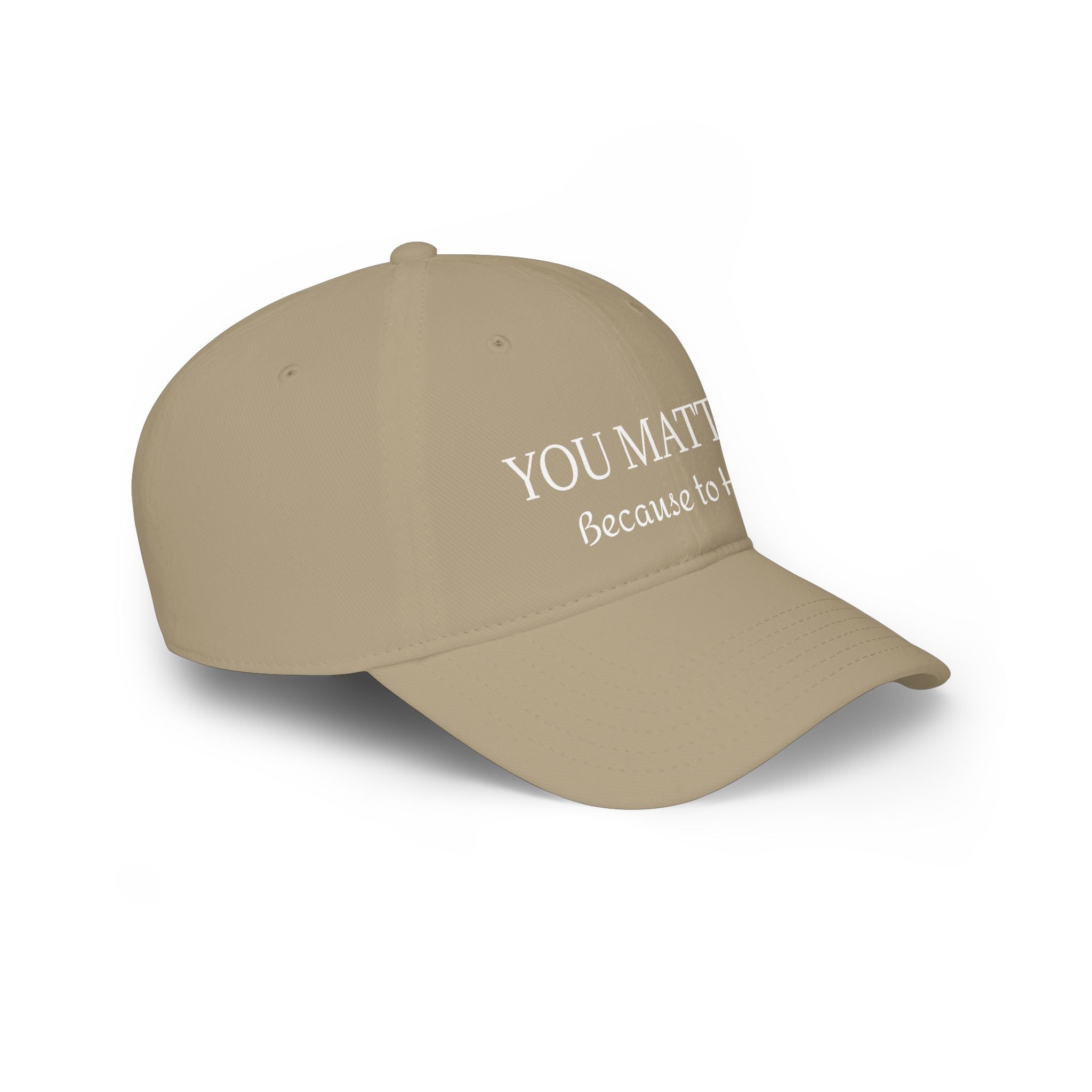 Tan baseball cap with 'YOU MATTER Because to' text, handcrafted with natural materials
