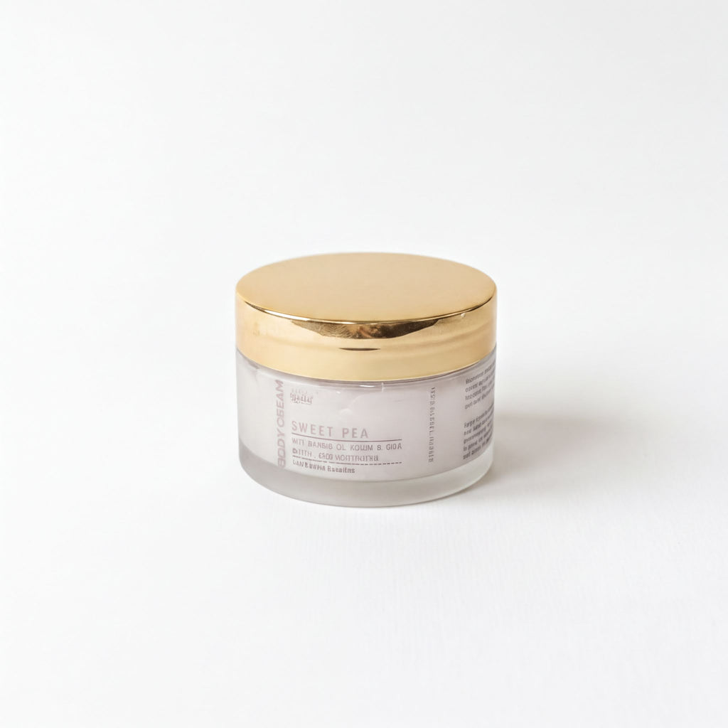 A jar of "Sweet PEA" lotion with a gold lid, sitting on a white background.