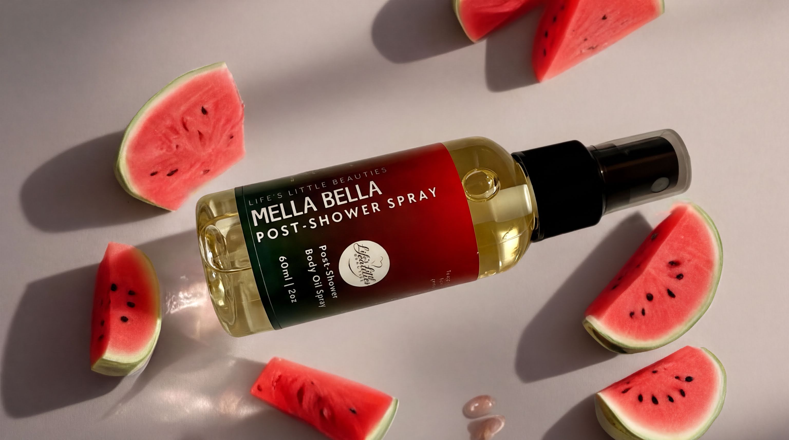a bottle of Mella Bella Post-Shower Spray surrounded by slices of watermelon on a white background.