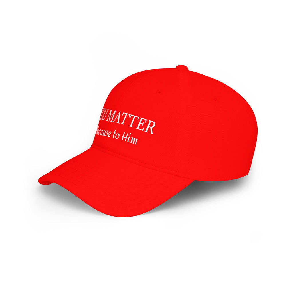 Red baseball cap with white text 'YOU MATTER Because to Him' on clean background