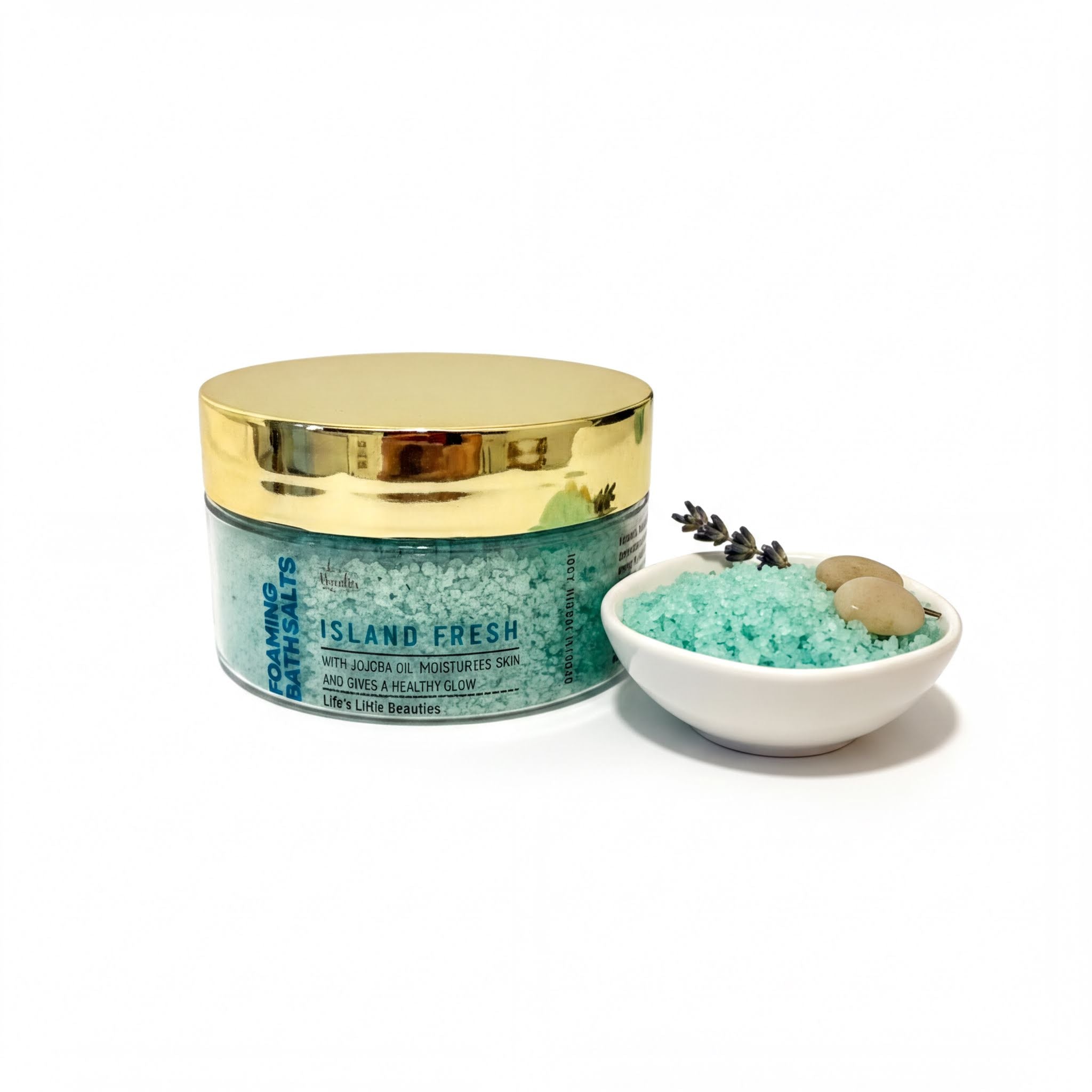 a jar of "Island Fresh" bath salt next to a small white bowl filled with the same bath salt.