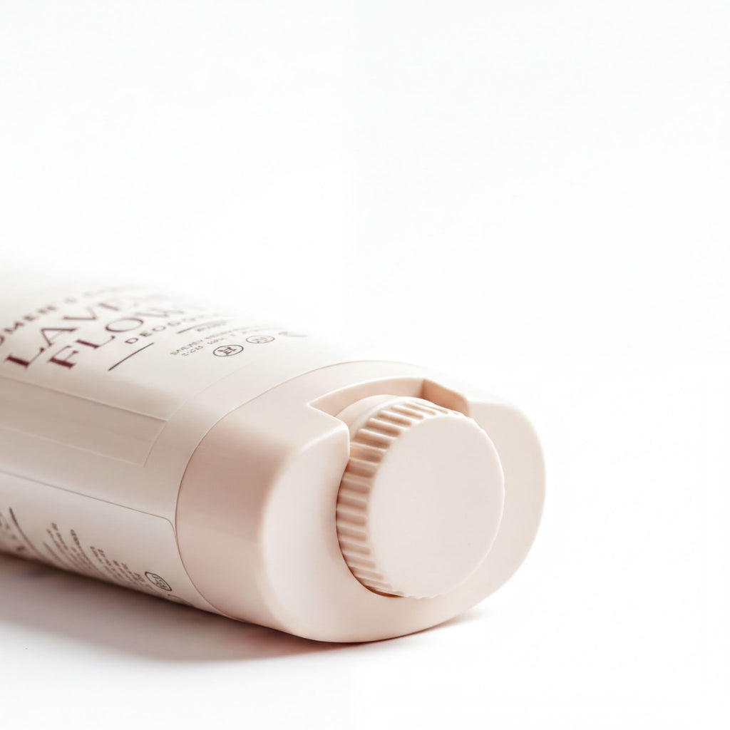 A close-up image of a cream container with a knob on the lid.