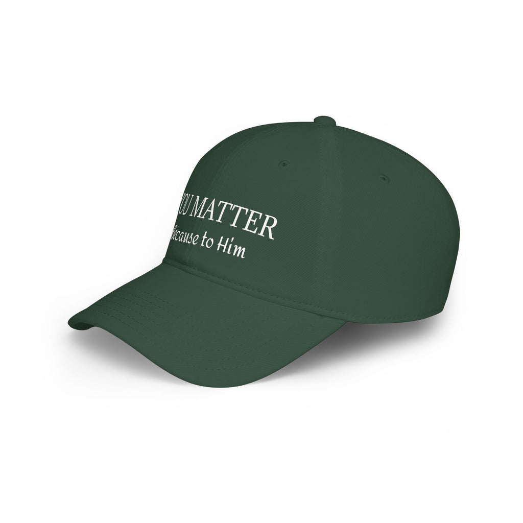 Dark green cap with white text 'YOU MATTER Because to Him' on front panel