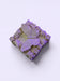 A decorative soap with a butterfly design on it.