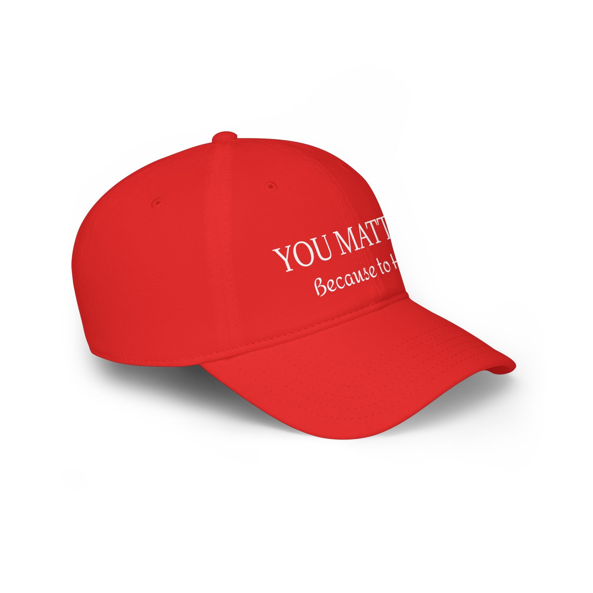 Red cap with 'YOU MATTER Because to' text, handcrafted with natural materials