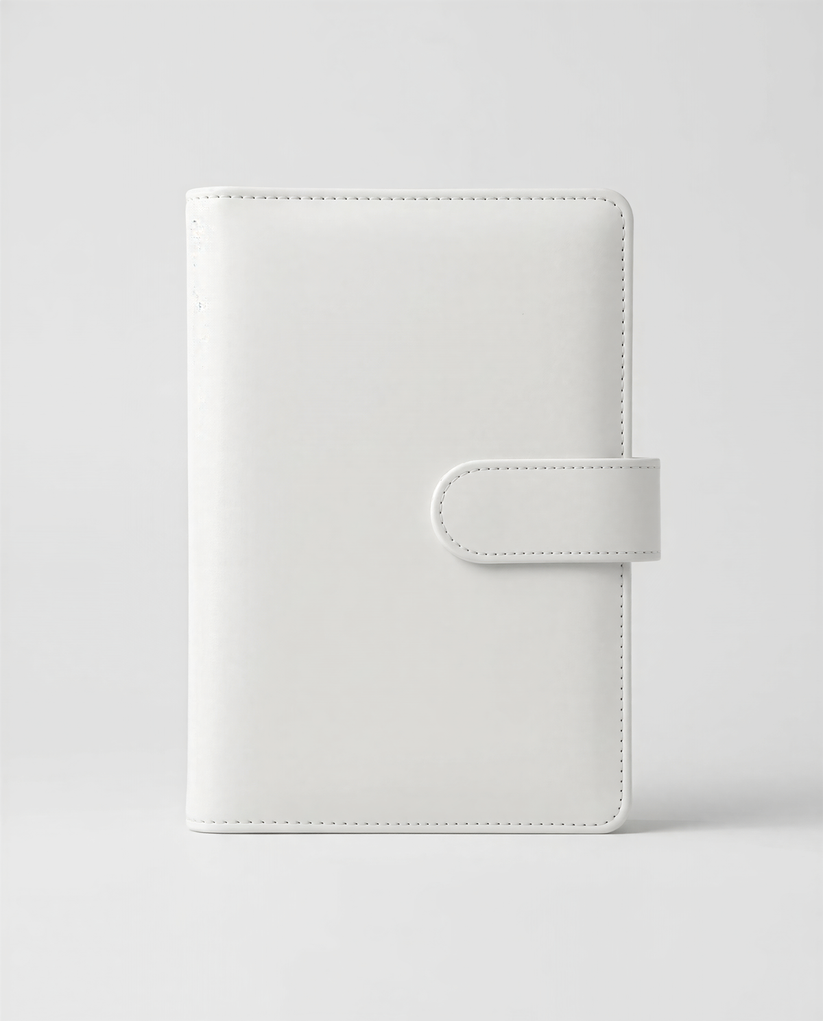 A plain white leather wallet or card holder is shown against a white background.