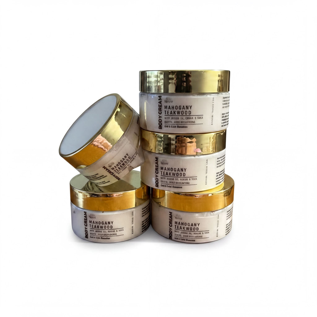 a stack of four jars with gold-colored lids, each containing a different product labeled as "Mangly Teakwood".