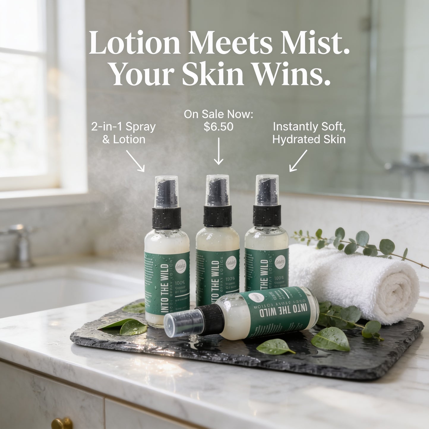 three bottles of lotion placed on a marble countertop, with a rolled-up white towel and some greenery nearby.