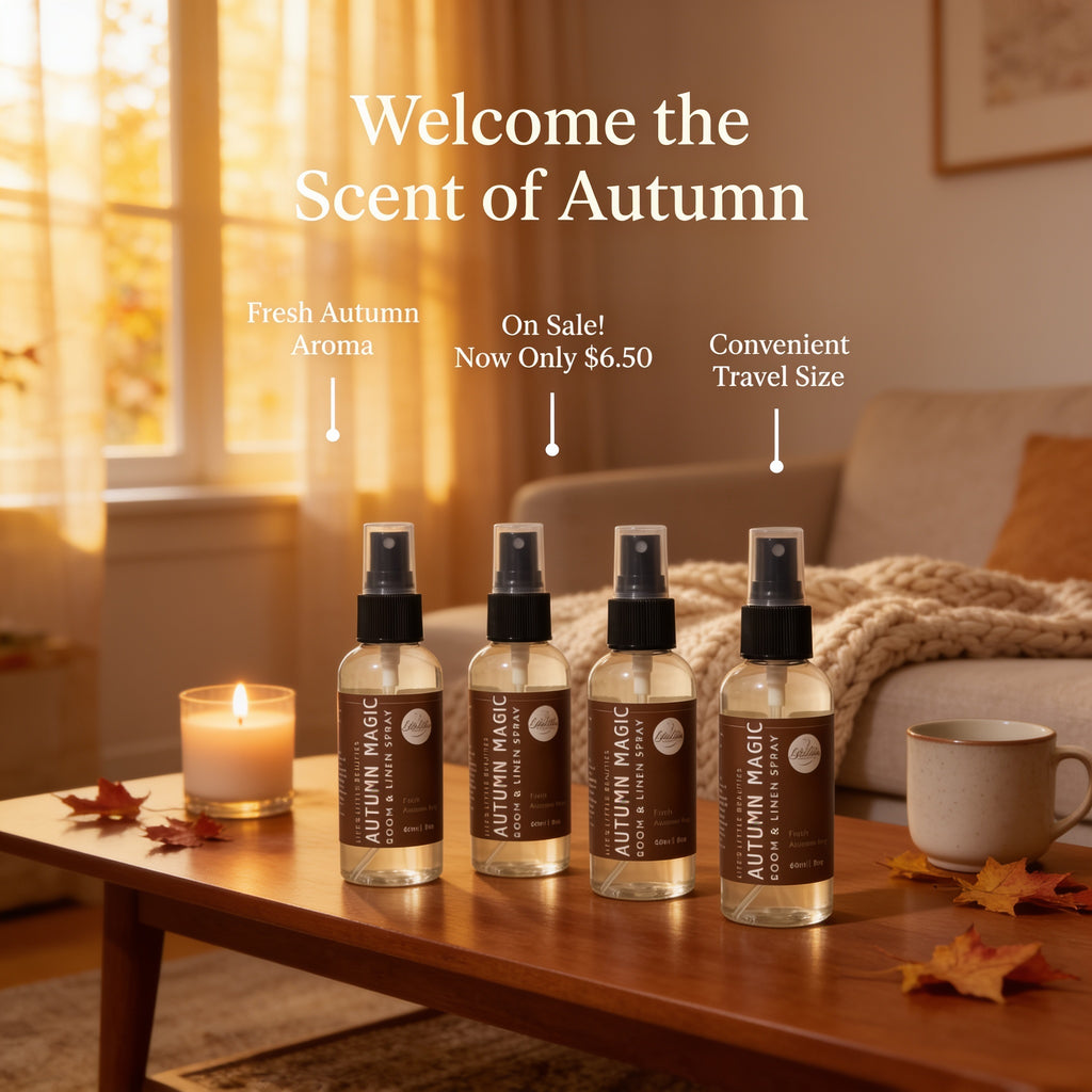four bottles of "Autumn Magic" essential oil diffuser on a wooden table, with a lit candle and autumn leaves nearby.