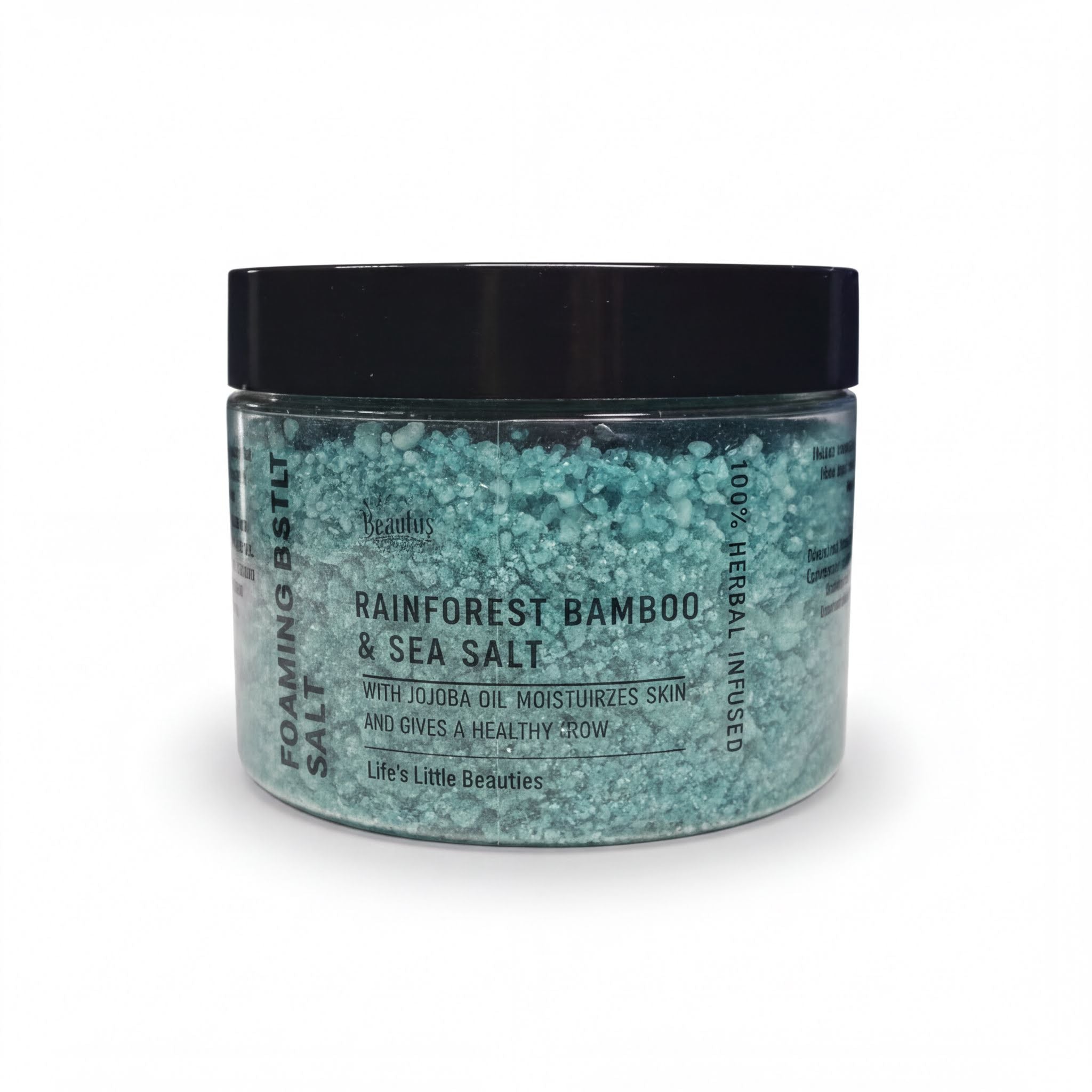 A jar of "Rainforest Bamboo & Sea Salt" with a black lid, containing a light blue-green substance that appears to be a natural exfoliant.