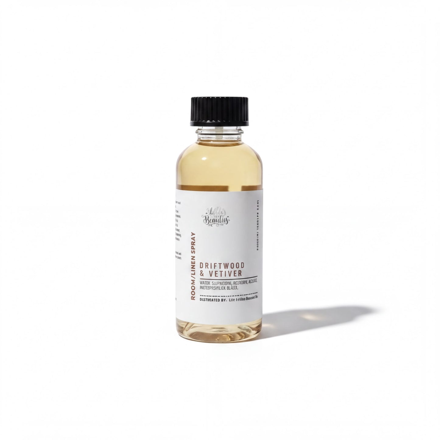 a bottle of Driftwood & Meilver, a product with a white label and a black cap.