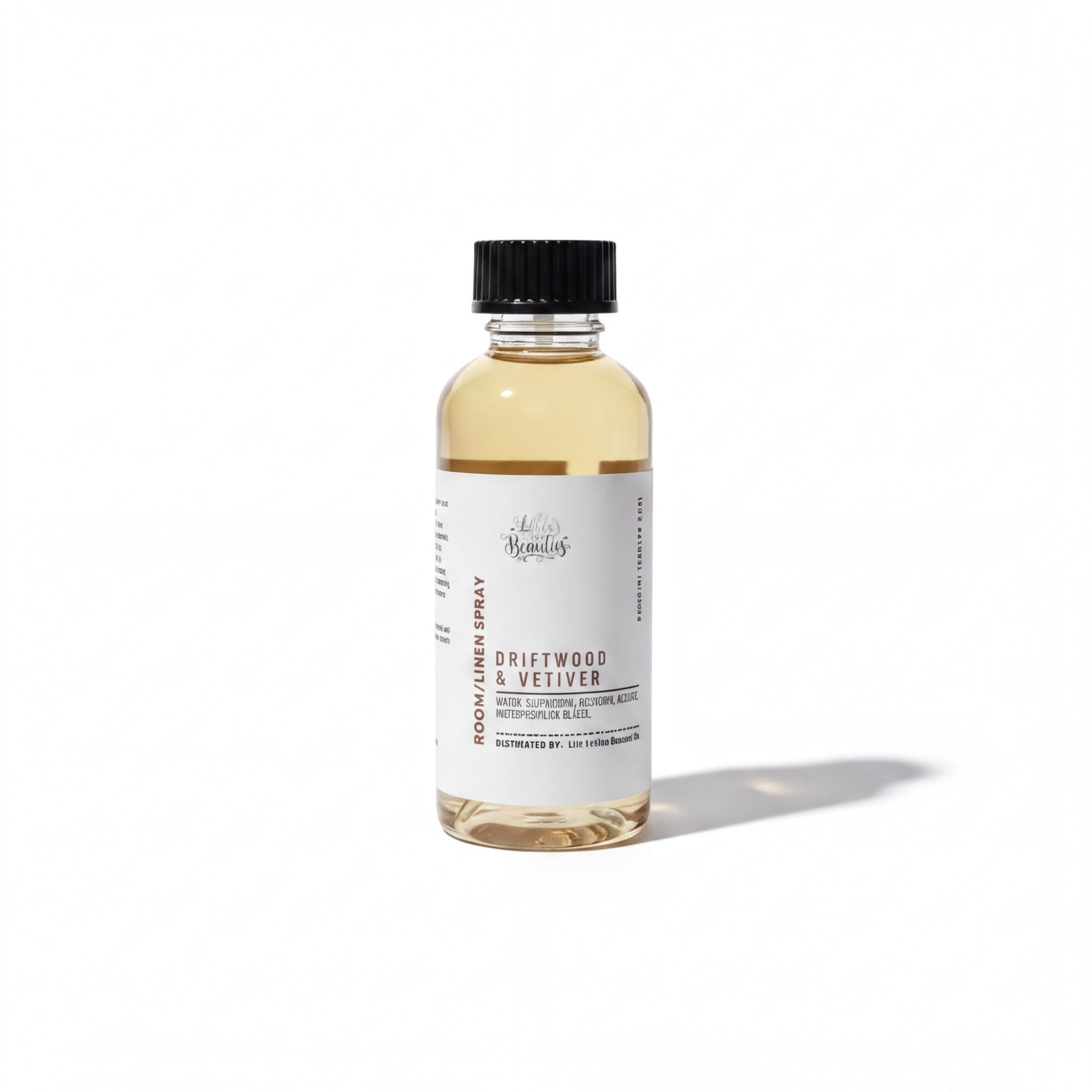 a bottle of Driftwood & Meilver, a product with a white label and a black cap.