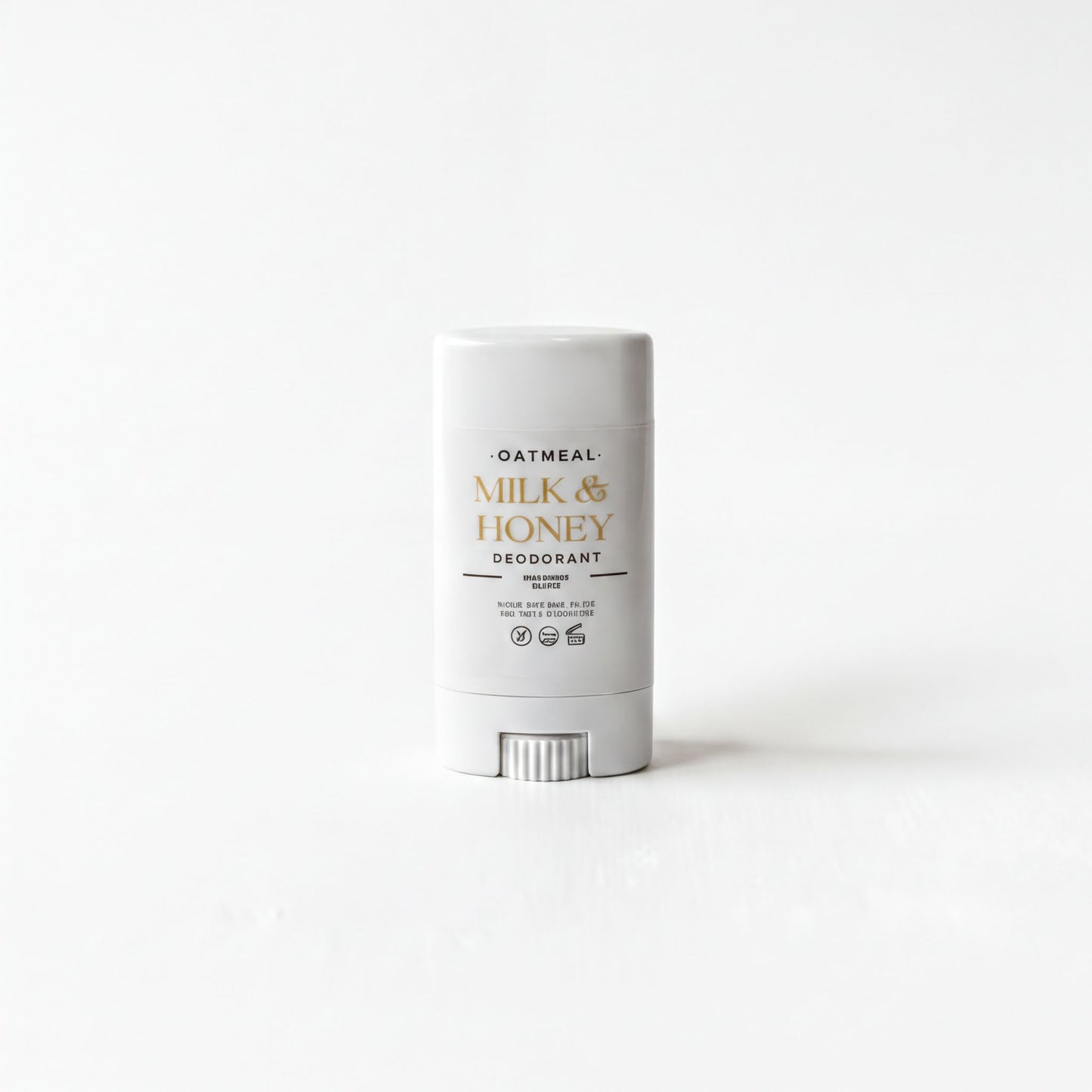 A white deodorant stick with a label that reads "OATMEAL MILK & HONEY DEODORANT" and "B cruelty free vegan".