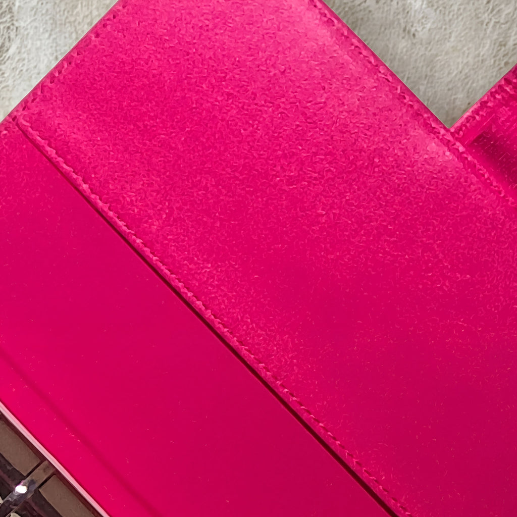 Vibrant pink textured soap bar with natural ingredients, handcrafted for beauty routines.