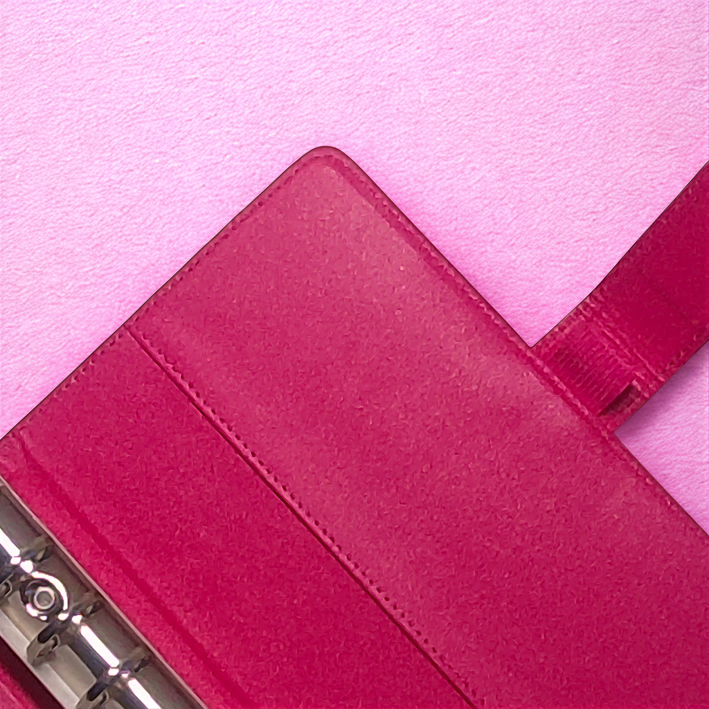 Pink textured soap bar with visible stitching on soft pink background