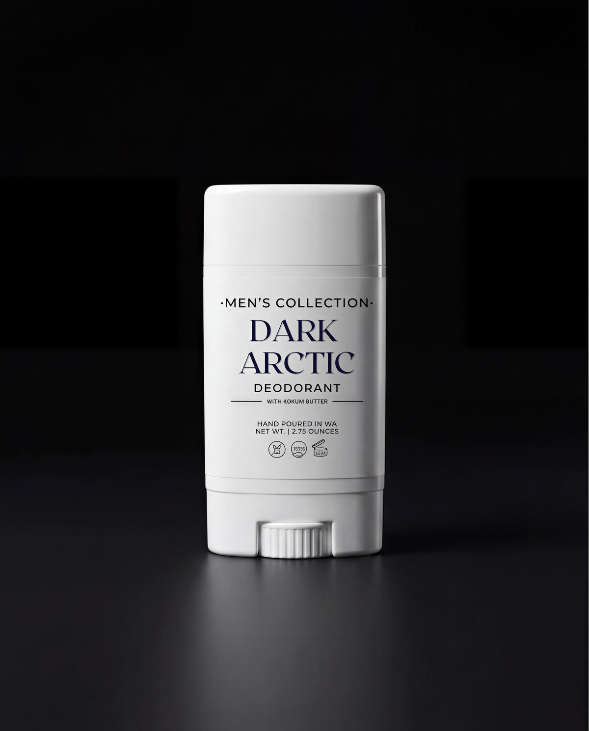 A white deodorant stick with black text, labeled as "Dark Arctic Deodorant" and "Hand Picked in WA NET. NET. 2 OZ. (90ml)".