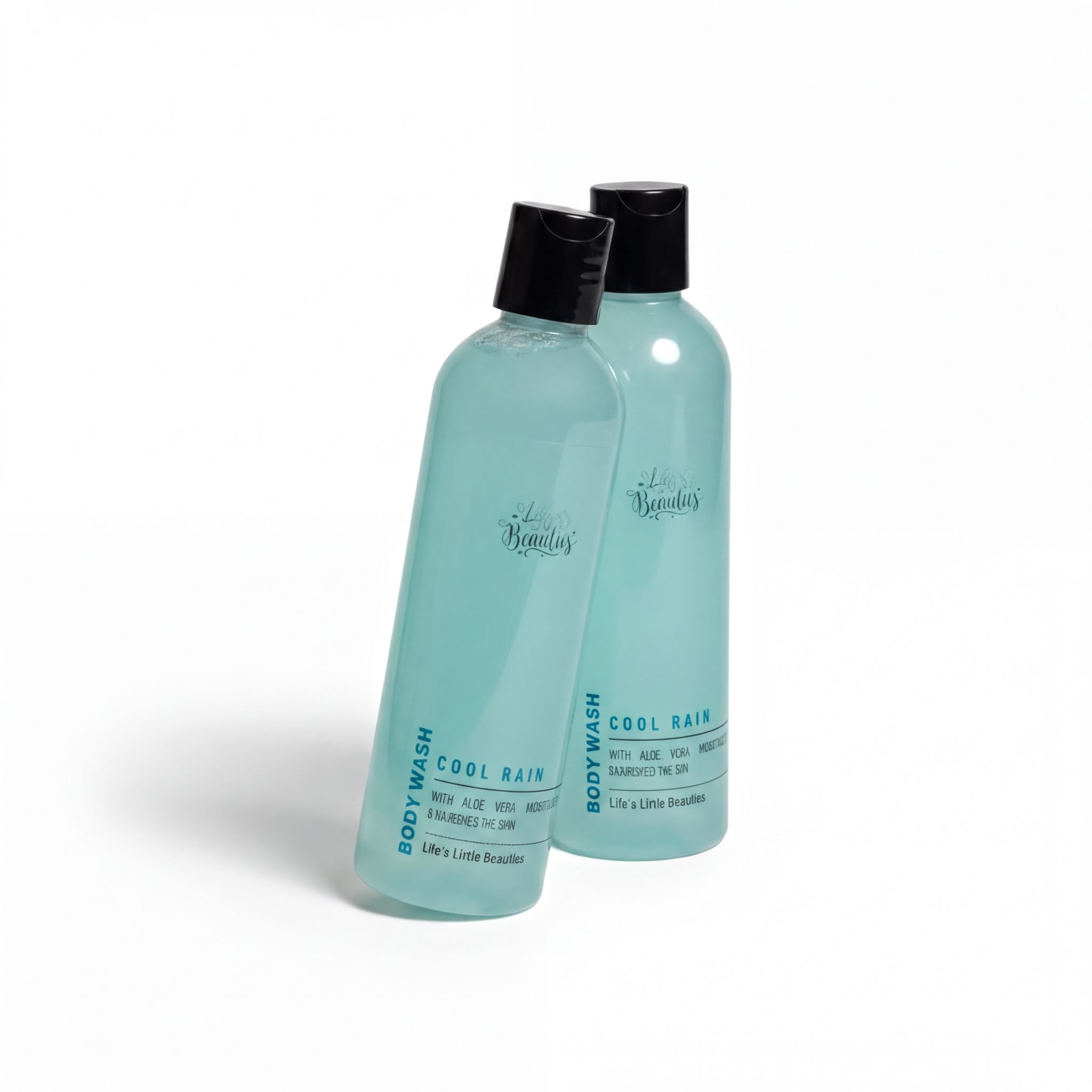 Two bottles of body wash with a light blue color and black caps, labeled as "Cool Rain" and "Life's Little Beauties".