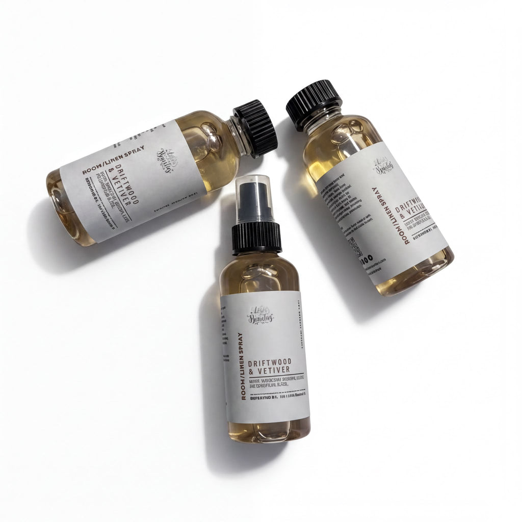 Three bottles of a brown liquid, possibly a hair spray or styling product, are arranged in a triangular formation on a white background.